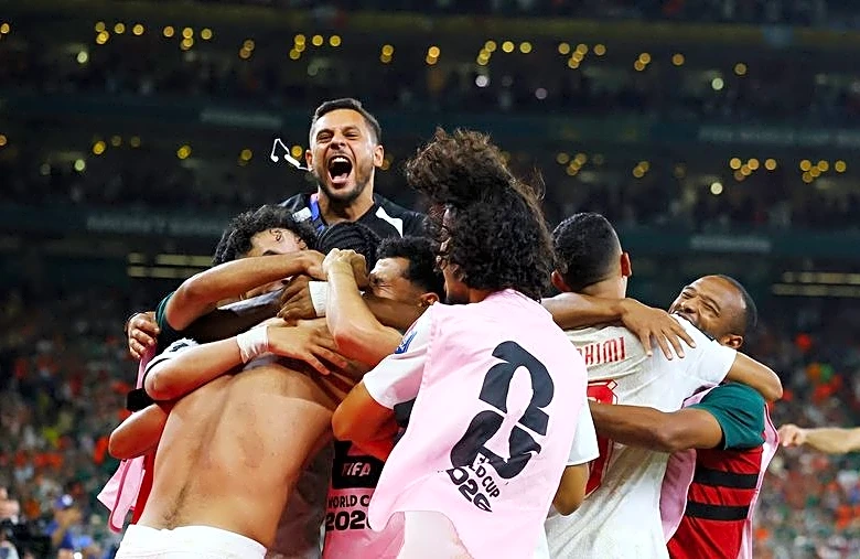Soccer-Morocco advance in World Cup after penalty shootout win over the Netherlands