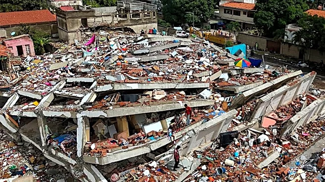 Between silence and shouts, rescuers dig for Venezuela twin quake survivors