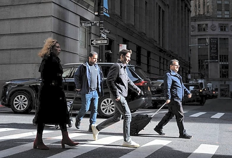 US private payrolls gains slow in June; planned layoffs drop 53%