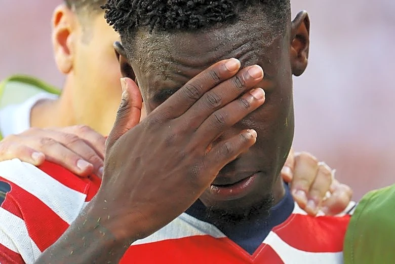 Soccer-US coach Pochettino says Balogun did not deserve red card