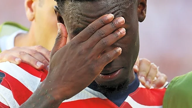 Soccer-US coach Pochettino says Balogun did not deserve red card