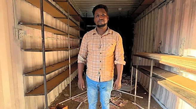 Scared but staying: Some migrants dig in as South Africa turns hostile