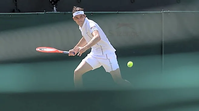 Tennis-Fritz flies past Kypson to reach Wimbledon third round