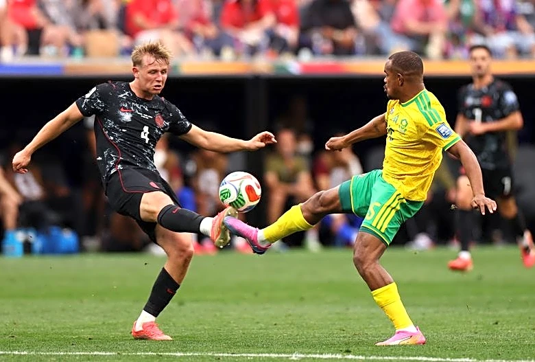 Soccer-Canada’s De Fougerolles learning fast on World Cup stage