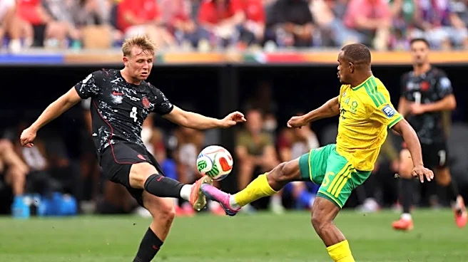 Soccer-Canada’s De Fougerolles learning fast on World Cup stage