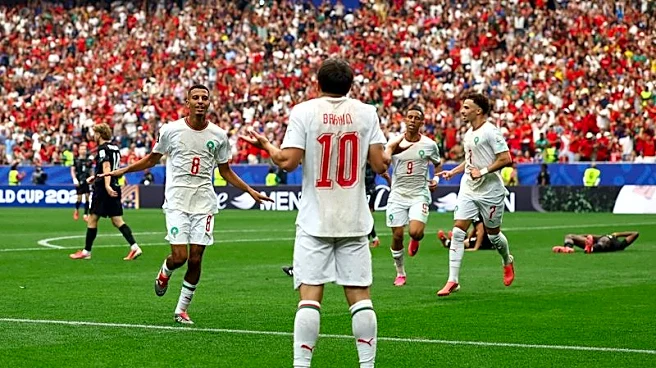 Soccer-Clinical Morocco ease past Canada 3-0 to reach World Cup quarter-finals