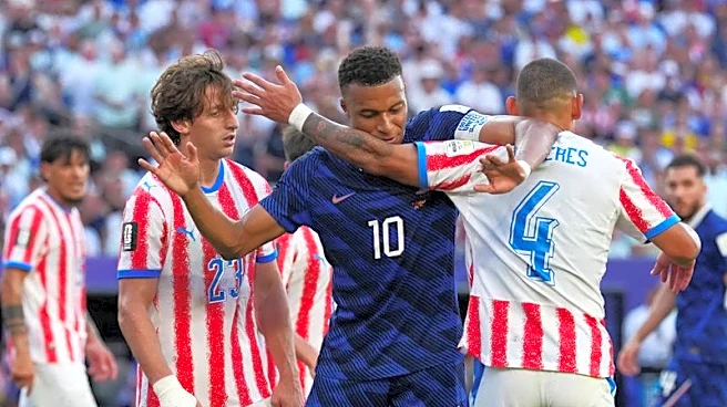 Soccer-France survive Paraguay's prickly test but warning lights flash