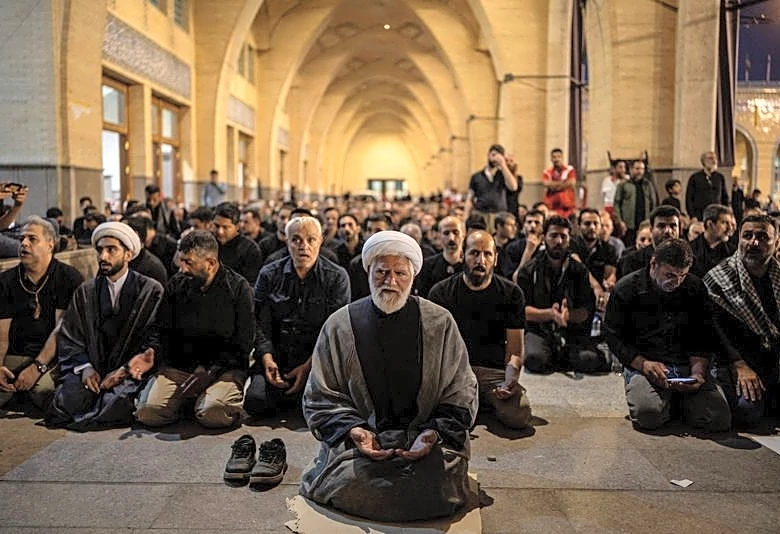 Three sons of Iran's slain leader Khamenei appear at funeral, not his successor