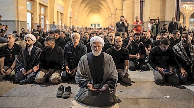 Three sons of Iran's slain leader Khamenei appear at funeral, not his successor