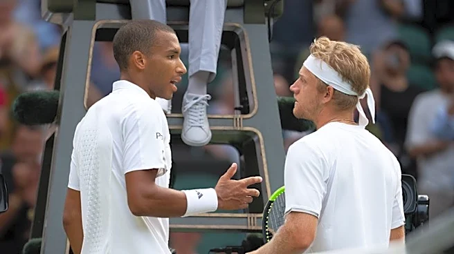 Tennis-Auger-Aliassime labels injury rule a disgrace after stormy win