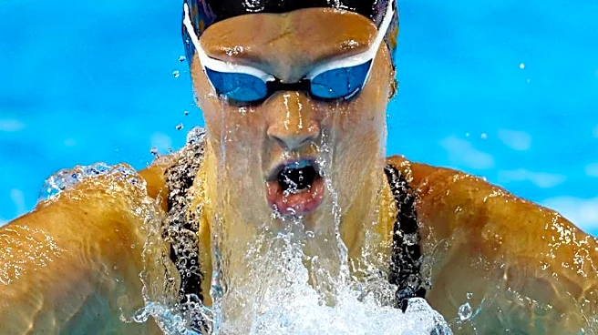 Swimming-Canada's McIntosh takes down last women's 'supersuit' world record