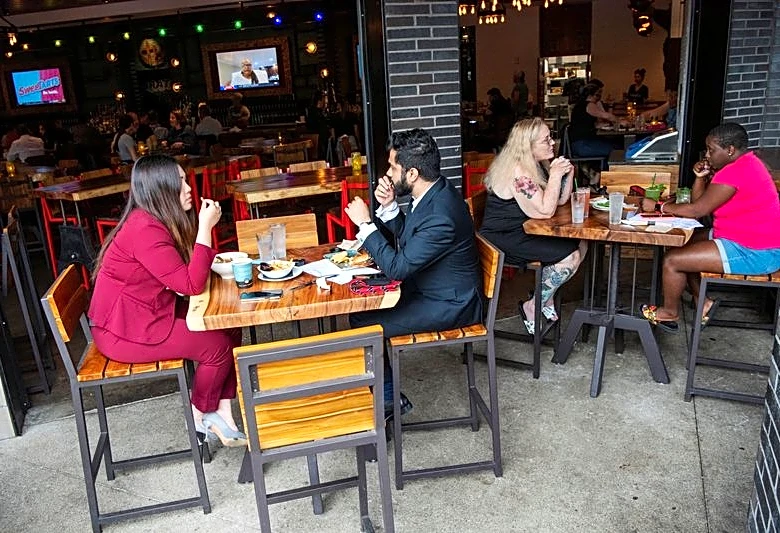 US service sector growth dips in June; employment rebounds after months of contraction