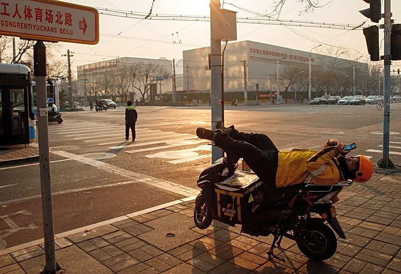 Analysis-China's booming gig economy masks job market pain, strains welfare system