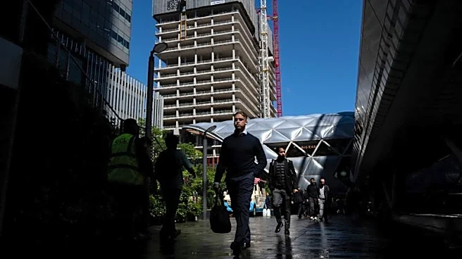UK jobs market downturn eases as pay pressure pick up, survey shows