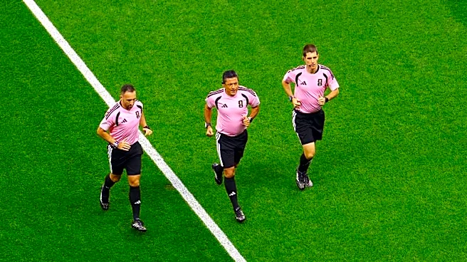 Soccer-The World Cup's hidden runners: referees keep pace with players and pressure