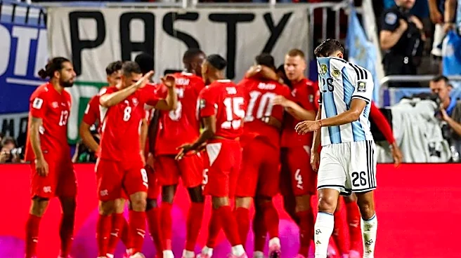 Soccer-Swiss anger tinged with pride after top eight World Cup finish