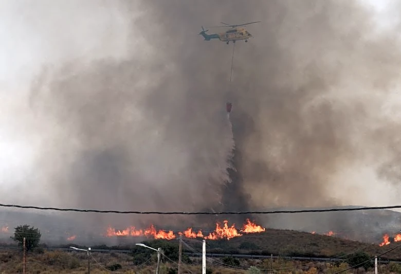 Spanish wildfires claim 13th victim as British woman, 93, dies of injuries