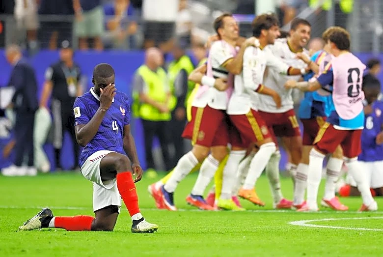 Soccer-France fail World Cup Spanish test in spectacular fashion