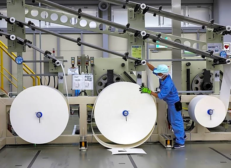 Japan manufacturers stay upbeat on chip demand, services hit by costs