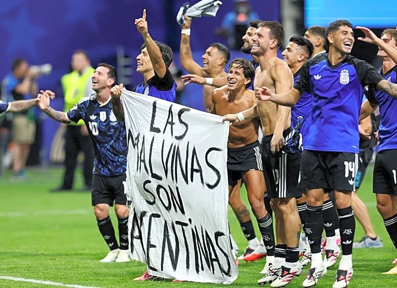 Soccer-Argentine players brandish political Falklands flag after England match