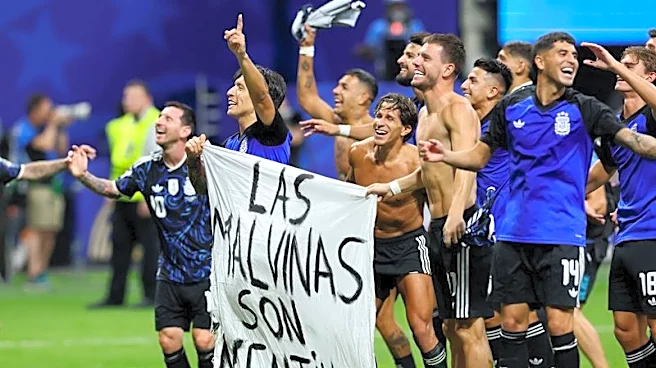 Soccer-Argentine players brandish political Falklands flag after England match