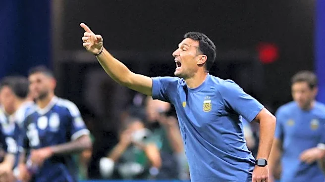 Soccer-Argentina are best with their backs to the wall, says coach Scaloni