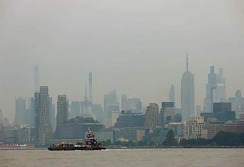 Soccer-Canadian wildfire smoke blankets New York before World Cup final, relief expected by Sunday