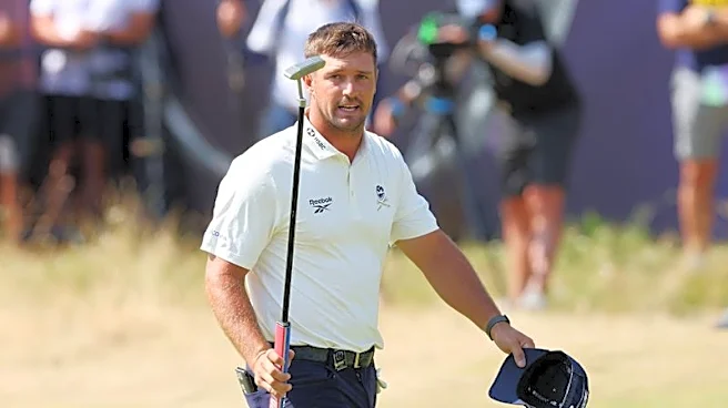Golf-DeChambeau answers Faldo's 'zero clue' jibe with 67 at Birkdale