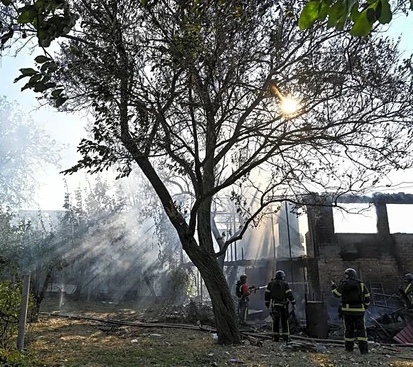 Russian and Ukrainian attacks kill at least 13, officials say