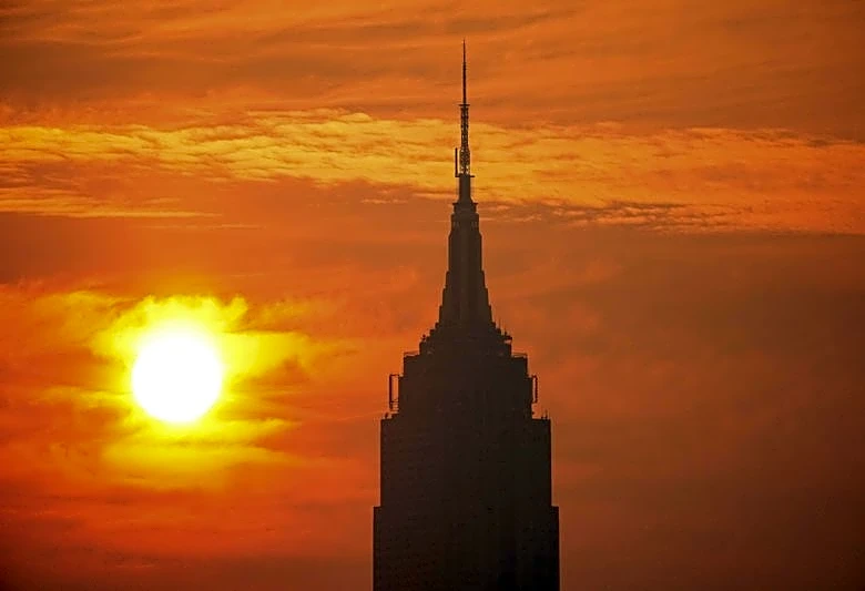 Smoke, fire, floods: US faces triple extreme summer weather threats
