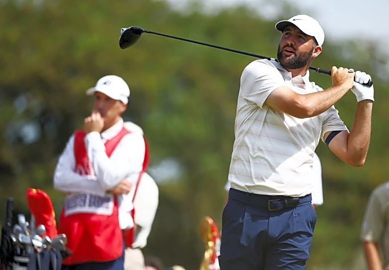 Golf-Scheffler defends Dechambeau after two-stroke penalty row