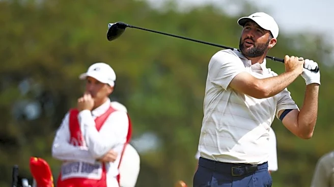 Golf-Scheffler defends Dechambeau after two-stroke penalty row