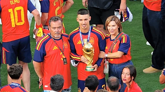 Soccer-Spain's ball worship delivers World Cup glory and a nation's shared embrace