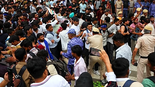 Police cane supporters of India's cockroach movement as thousands gather for march