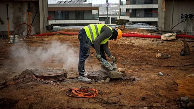 Analysis-Portugal's migrant curbs hit construction firms working to solve housing crisis