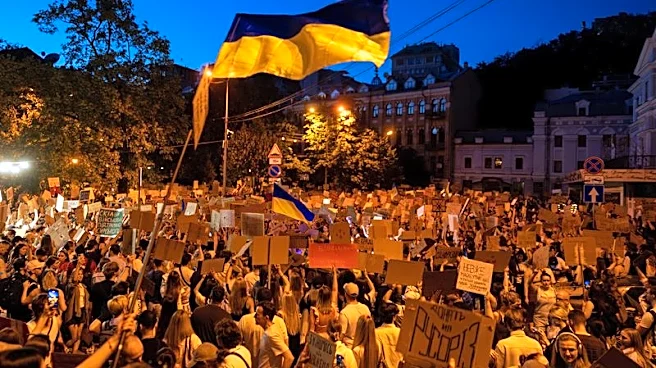 Ukraine's Zelenskiy meets commanders as street protests mount
