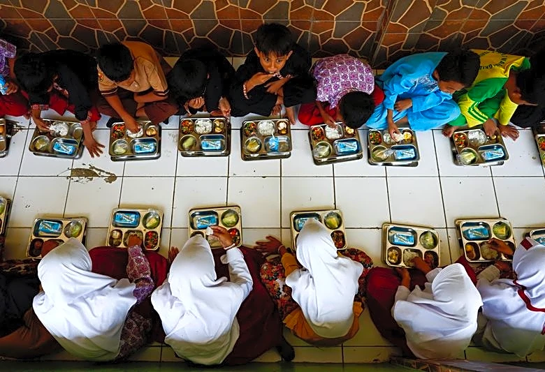 Indonesia cuts budget of president's free meals programme further to $12.8 billion