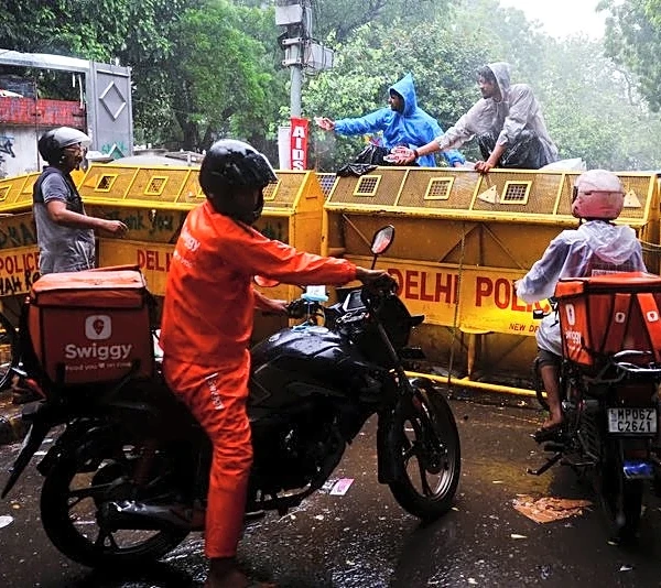 Food, fury and supporters near and far keep India protest alive