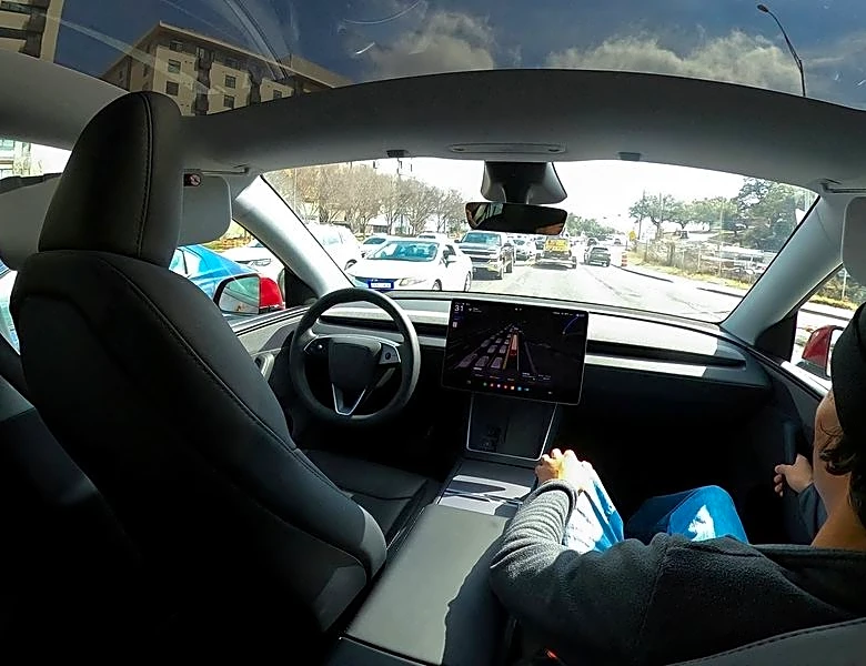 Tesla's once-bullish tone on robotaxis shifts