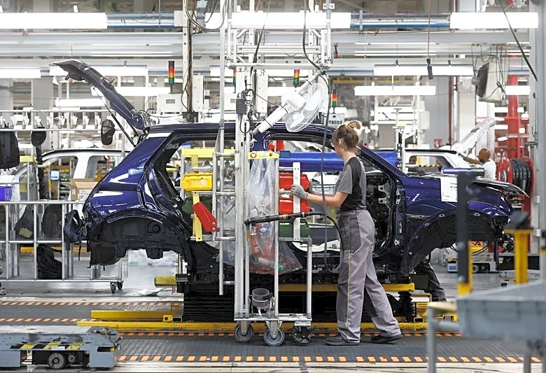 Euro zone business activity returns to growth in July for first time in four months, PMI shows