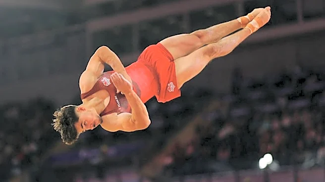 Gymnastics-England gymnast Langton conscious after heavy fall at Commonwealth Games