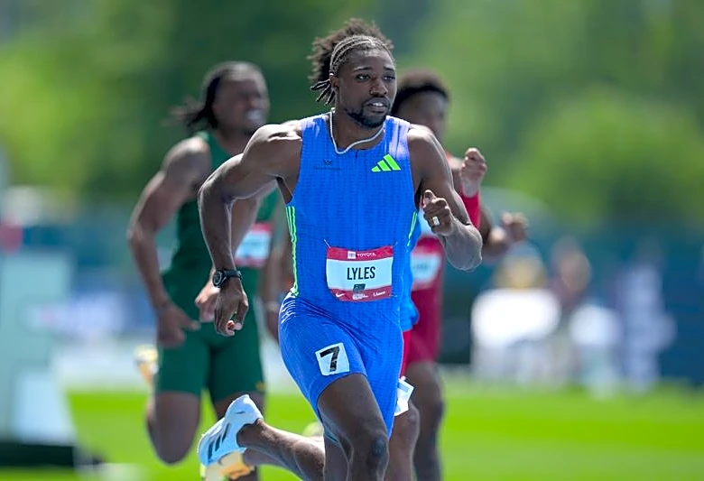 Athletics-Lyles eases injury fears after cramp halts 200m run