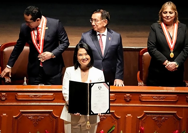 Peru's Fujimori takes power, extending Latin America's rightward tilt