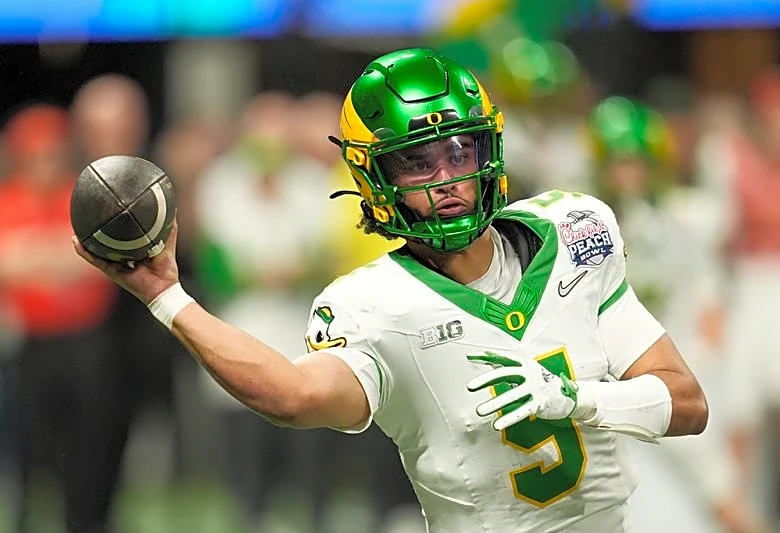 Oregon's Dante Moore: Return about natty, not dodging Jets