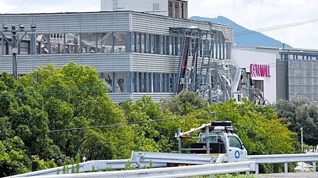Japan quake toll rises to 13 as rescuers haul people from collapsed mall