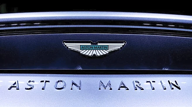 Aston Martin loss wider than expected, keeps annual outlook intact