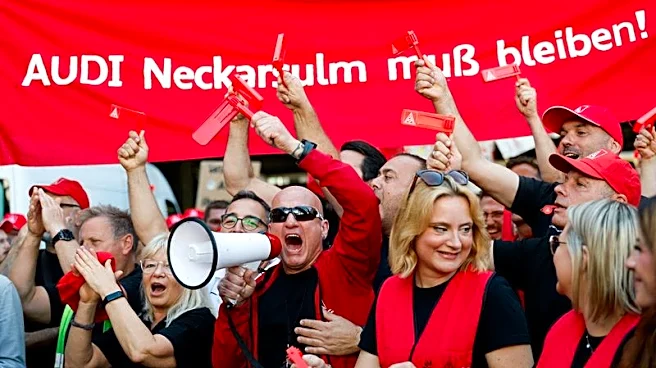 Thousands of Audi workers protest over threatened plant closure
