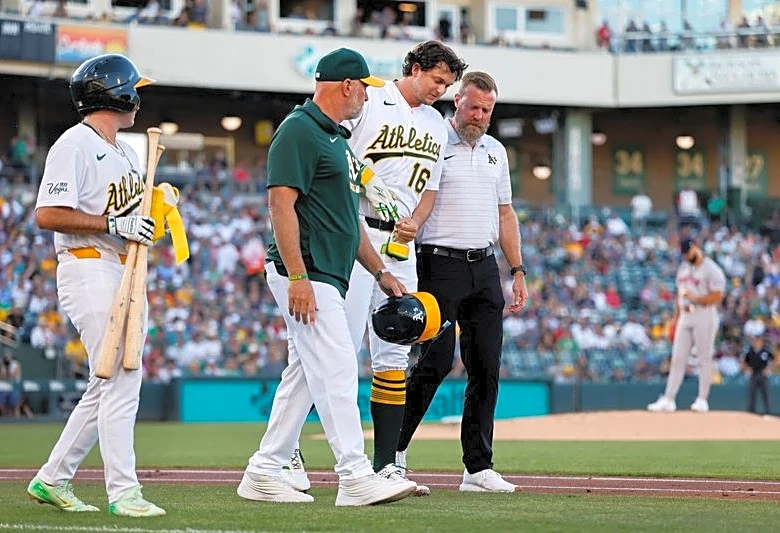 Athletics' Nick Kurtz exits after being hit by pitch vs. Red Sox