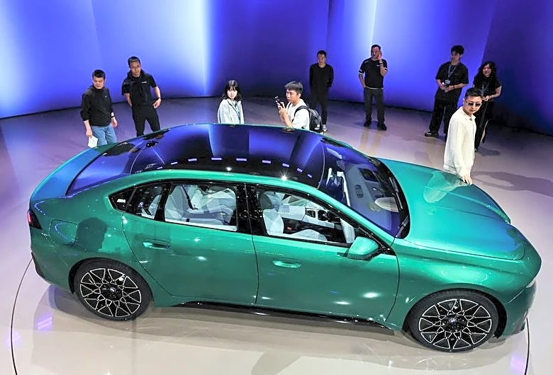 BMW to review practices once deemed 'untouchable' as profit slumps