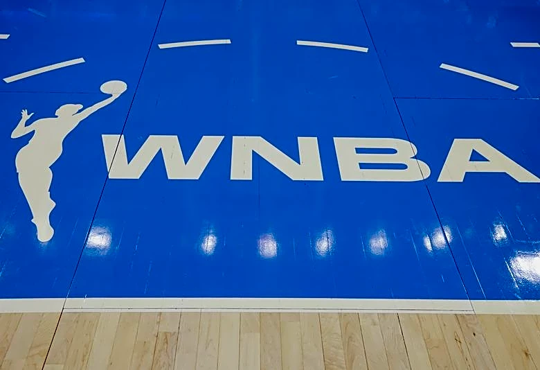 WNBA bars Storm co-owner 5 home games after fan exchange